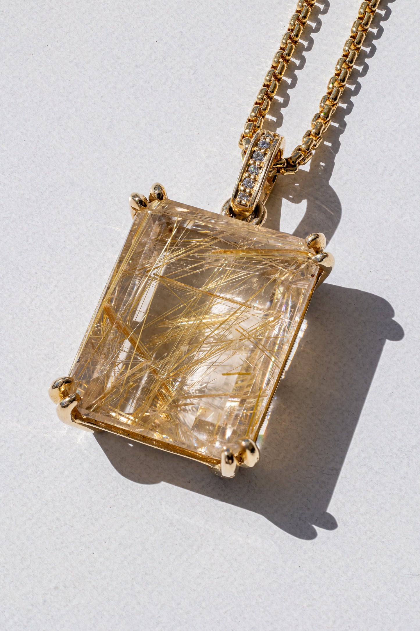 Rutilated Quartz and Diamond Bale Pendant in 18K Yellow Gold